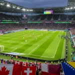World Cup 2026 Group B featuring Canada, Switzerland, Qatar, and Bosnia and Herzegovina flags with tournament branding